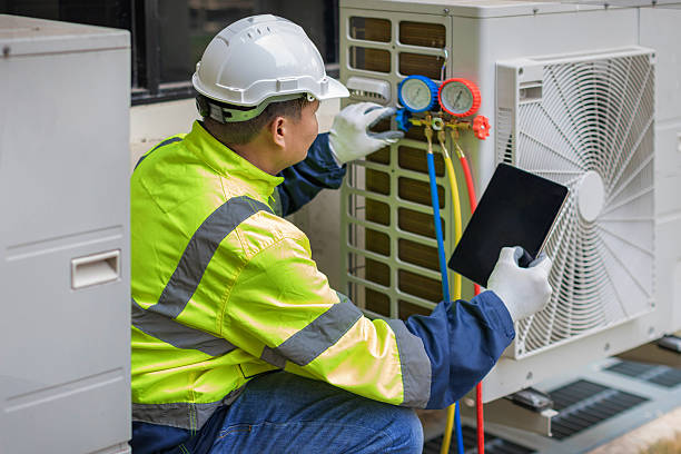 Professional Heat Pump Repair technician working in Dobson, NC